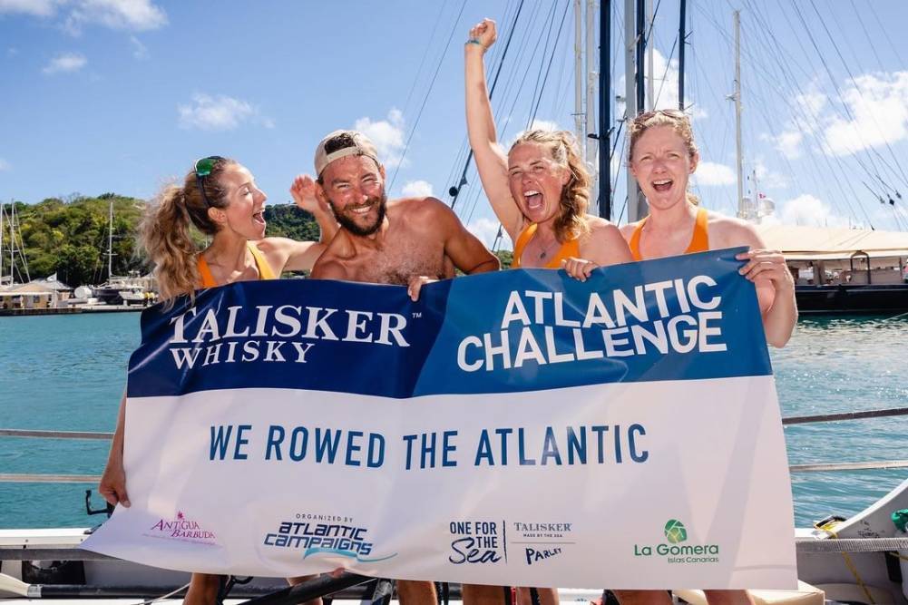 Jessica, Joe, Jess and Lauren celebrate after completing their race