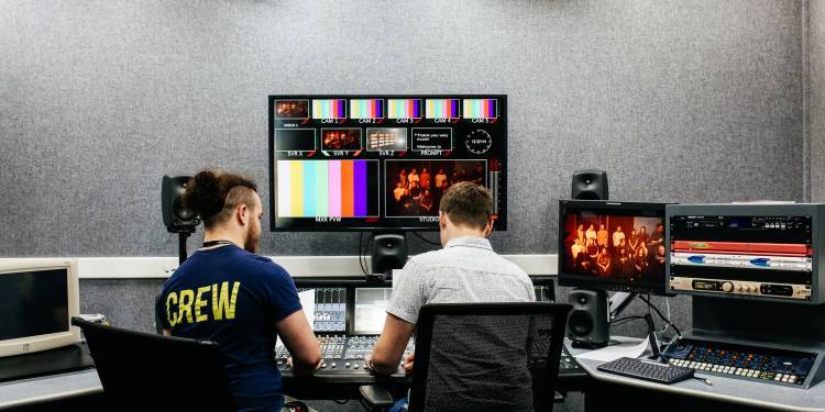 Students working in TV studio 