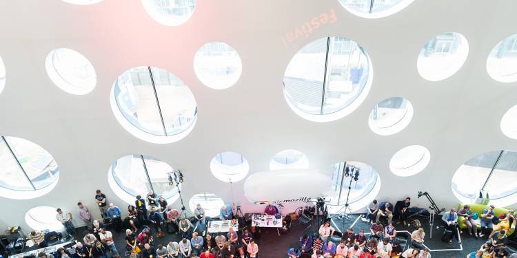 Image taken from level 4 inside Ravensbourne building looking down on an event
