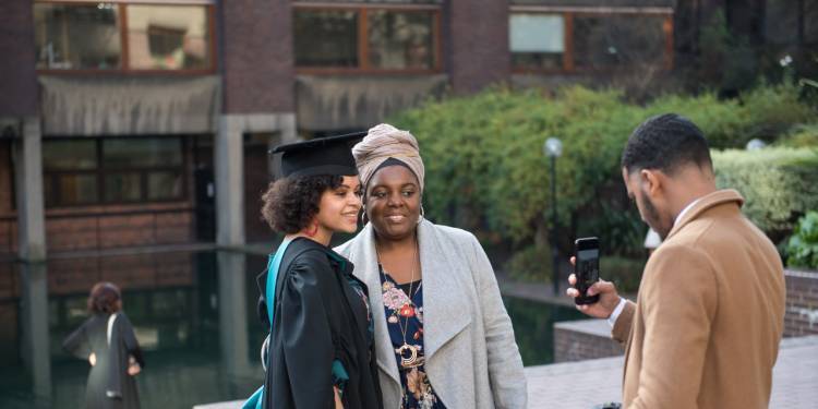 Parents and child on graduation