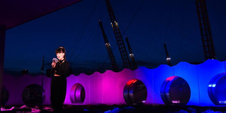 A singer performs on the Ravensbourne roof