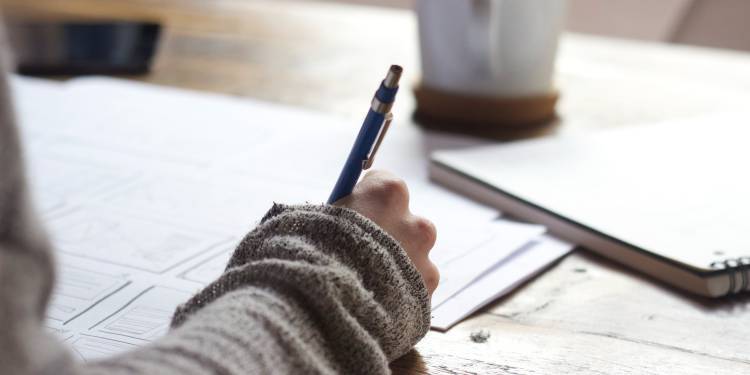 Girl making handwritten notes