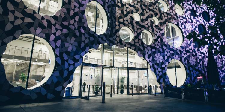 The Ravensbourne building lit up for a cosy evening