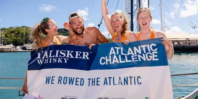 Jessica, Joe, Jess and Lauren celebrate after completing their race