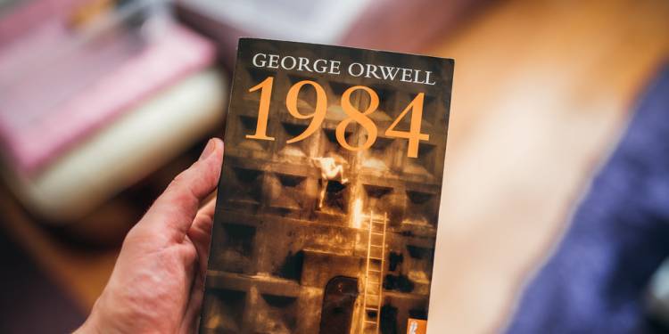 Person holds a 1984 book: Credit: Ivan Radic