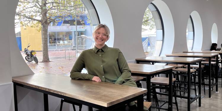 Laura Knowles sits in the Ravensbourne cafe