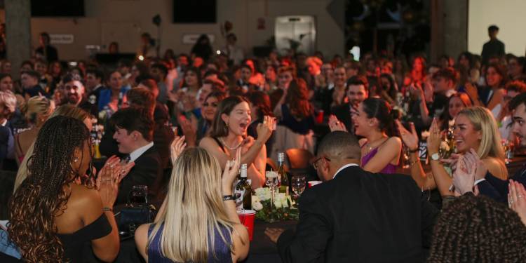 Students cheer at the awards ceremony