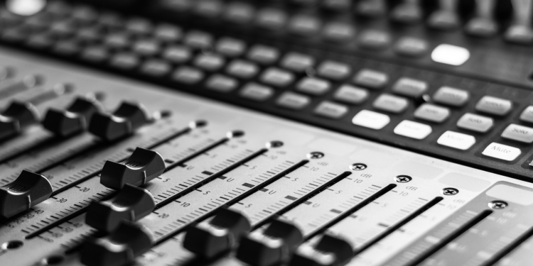 A close up of a mixing desk