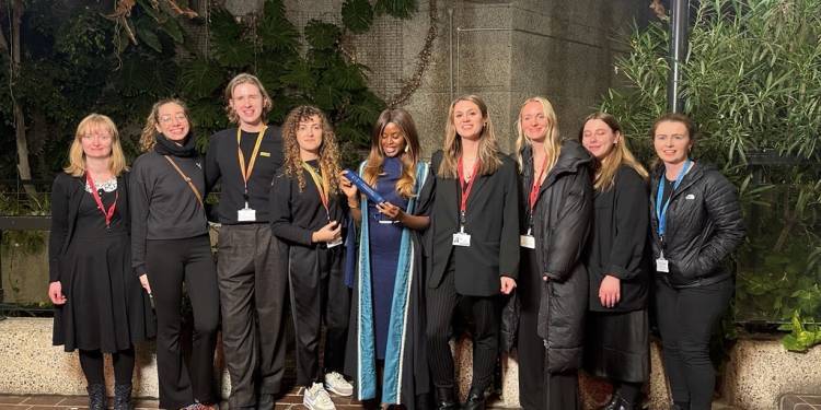 Ravensbourne staff members stand with June Sarpong