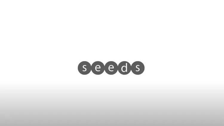 The word 'SEEDS' written in black in the middle of a white background