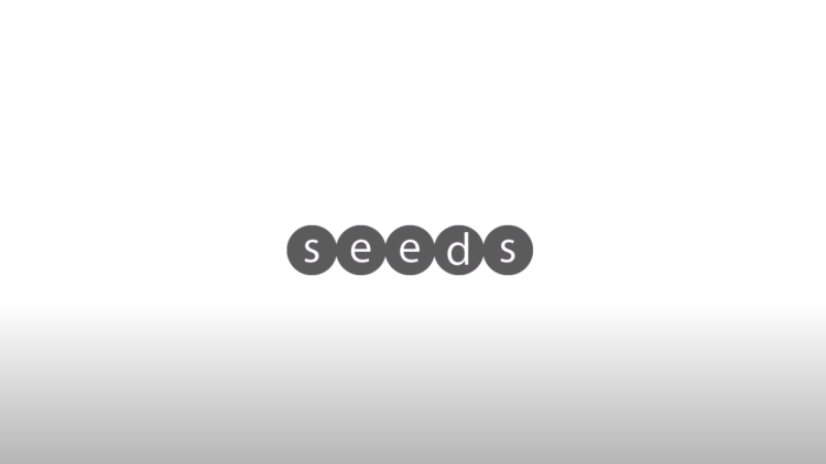 The word 'SEEDS' written in black in the middle of a white background