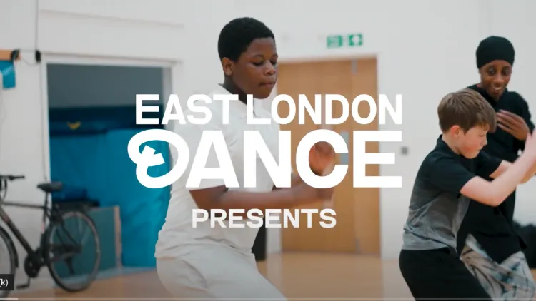 Boy dancing with the words 'East London Dance Presents' in white
