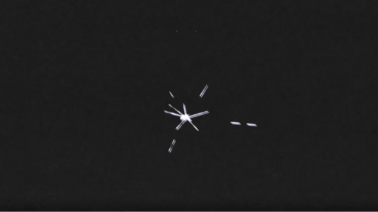 Small white illustrated star against a black background 