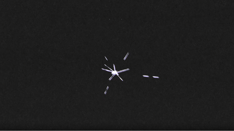 Small white illustrated star against a black background