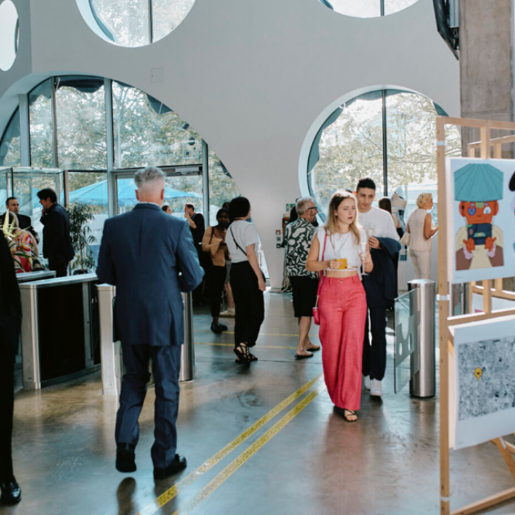 Students exploring student work at Ravensbourne's Annual Student Showcase event