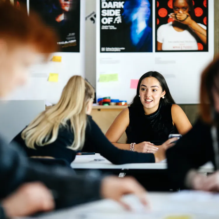 student smiling in classroom