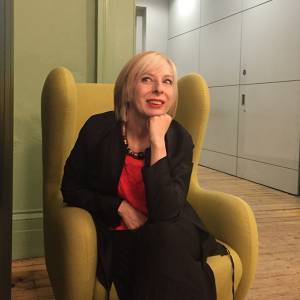Annette Richardson sat on chair