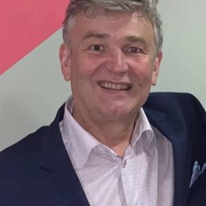 Man smiling in suit