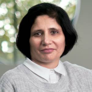 Headshot of a woman looking at the camera