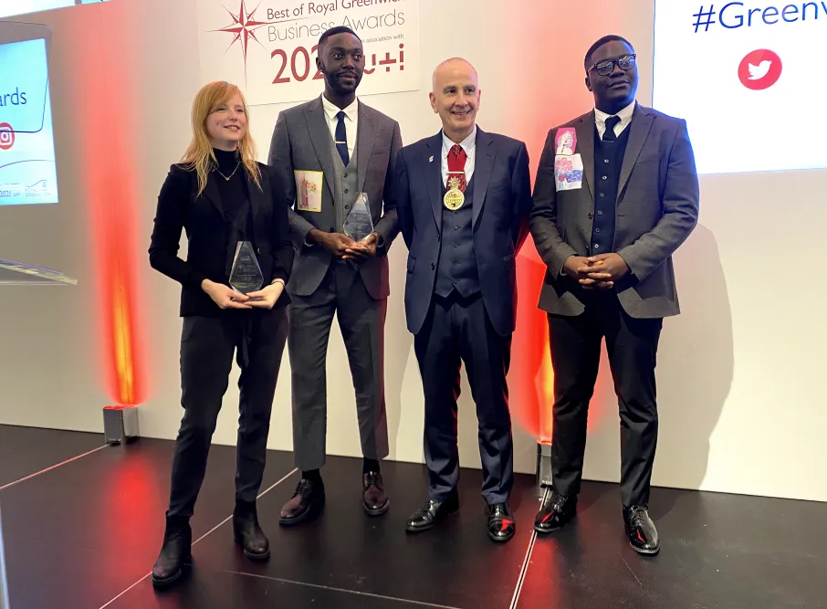 Tara Trangmar & Emmanuel and Lemuel Unaji at awards ceremony