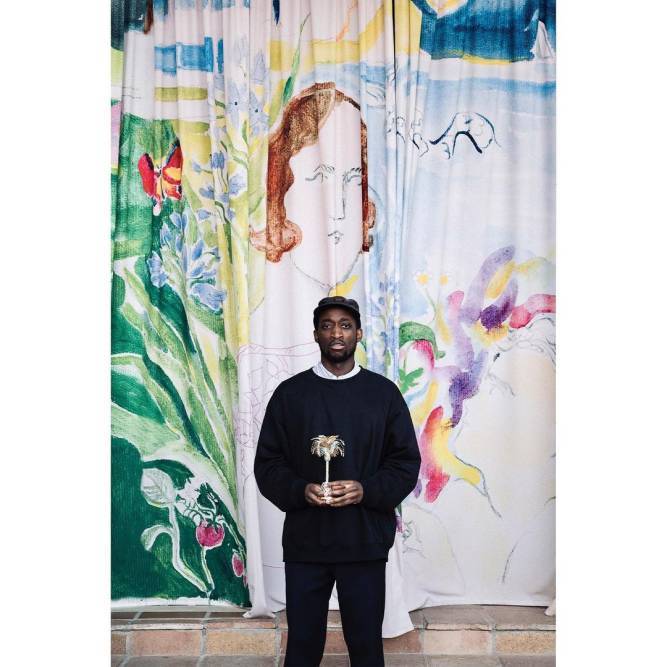 Ifeanyi Okwuadi holding award