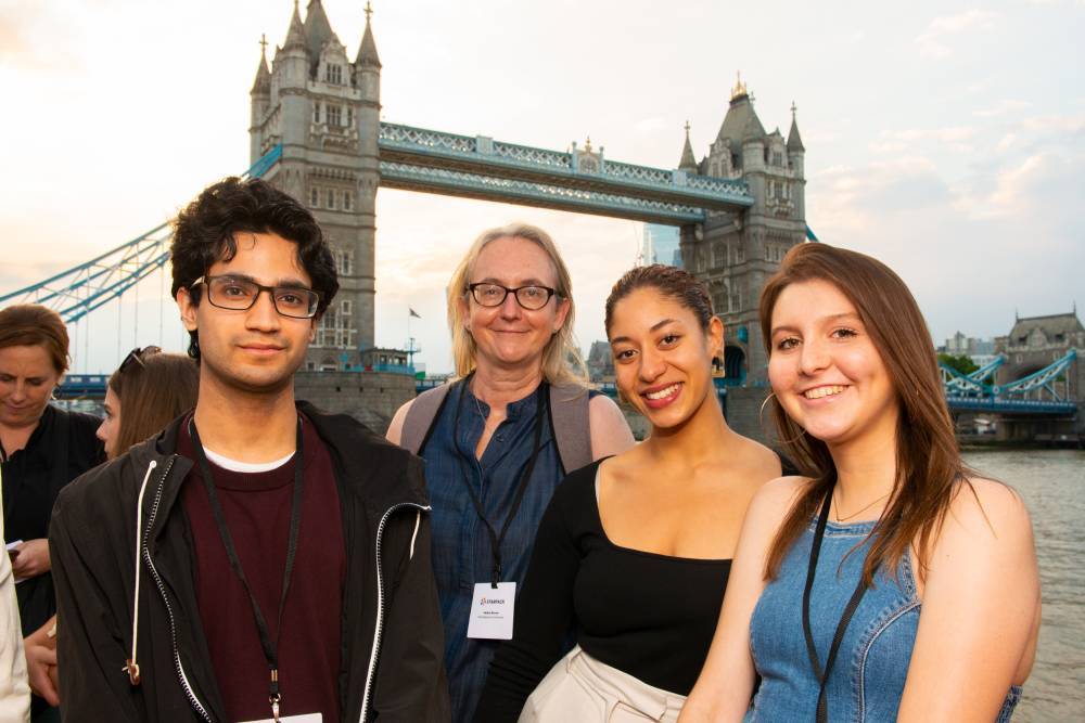 Starpack winners stand on bank of Thames at award ceremony