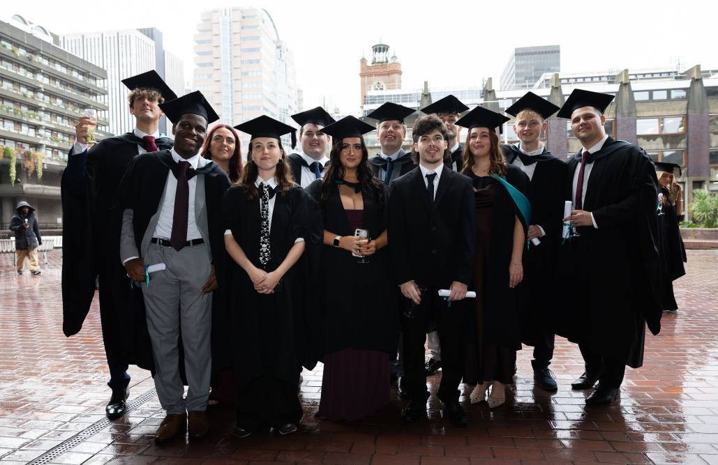 Graduates posing