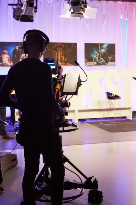 Broadcast engineering student working in our TV studio