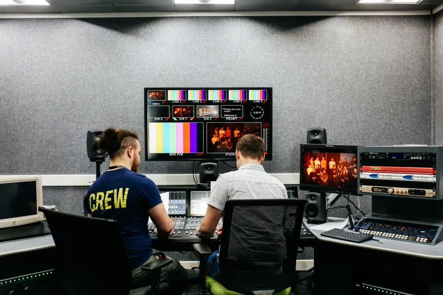 two-male-students-sat-at-sound-gallery
