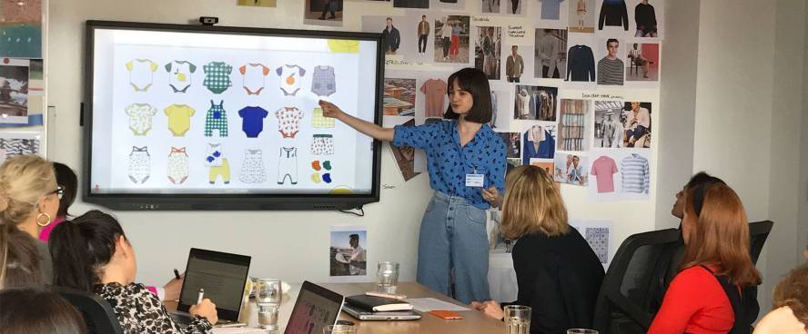 Student presents work on undergraduate Fashion Buying and Brand Management course