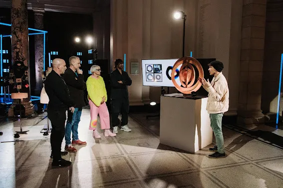 Calum presents work to the judges on The Big Design Challenge