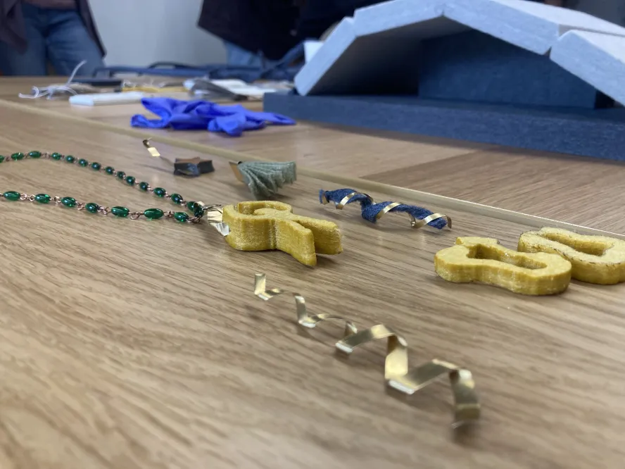 Necklace pendant made from offcut materials