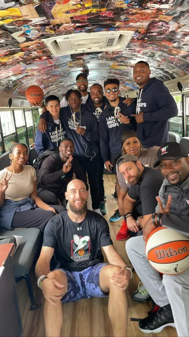 Ravensbourne and MBK Alliance students take a group photo with pro basketball players