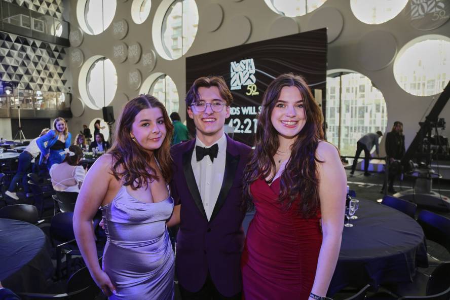 Students posing for photographs at NaSTA Awards ceremony