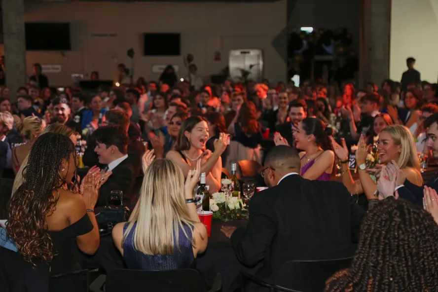 Students cheer at the awards ceremony