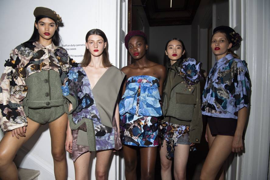 Modesl wearing textured outfits including shorts and berets