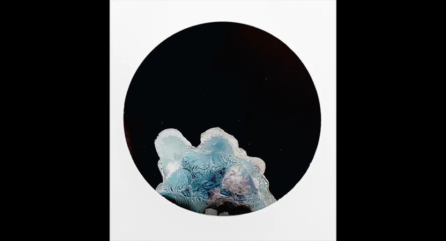 Abstract cloud shapes on a black circle