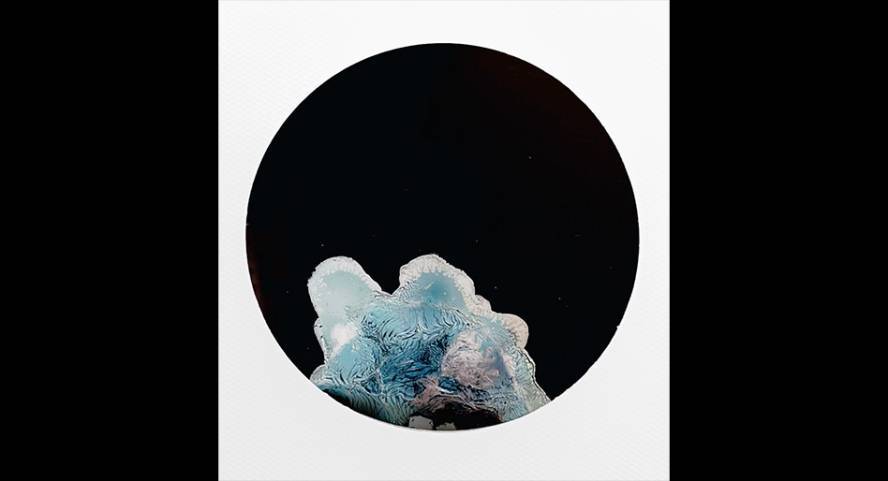 Abstract cloud shapes on a black circle