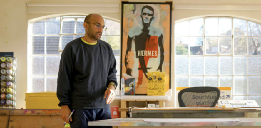 Ravensbourne University lecturer in action doing artwork