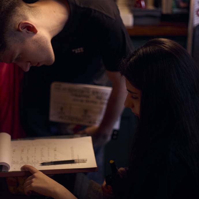 Film students reviewing script for Strongbow video