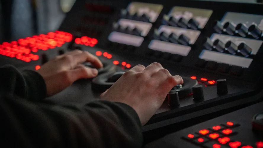 Grading in process by editing and post production student