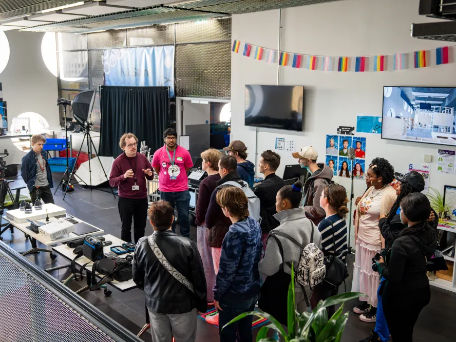 Students being shown around kit store