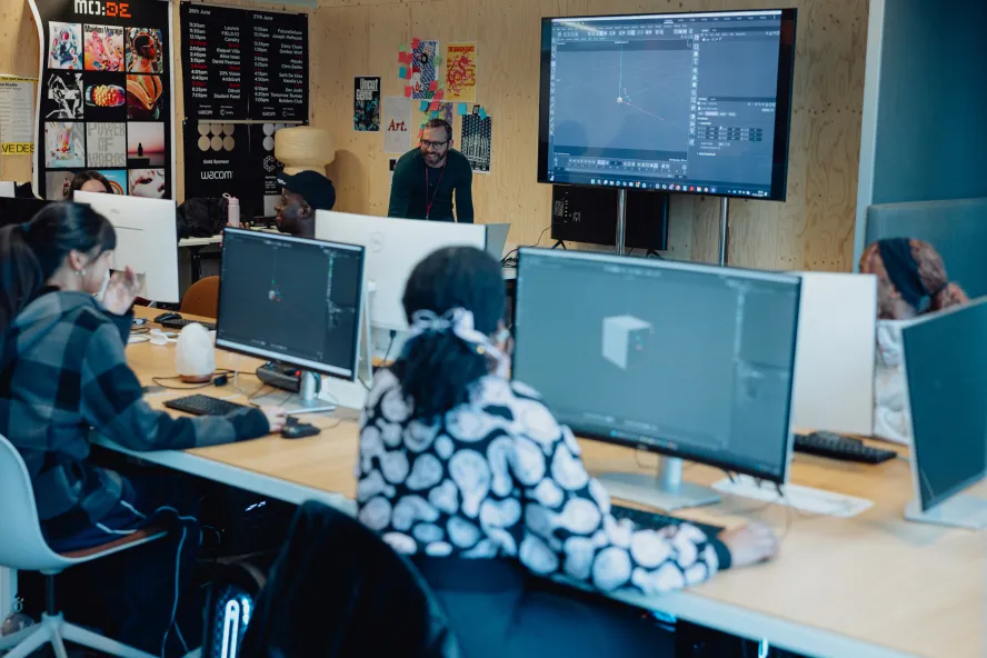 Ravensbourne students using a lab space for a motion graphics lecture