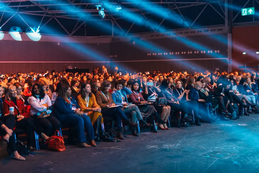 Delegates seated at a conference 