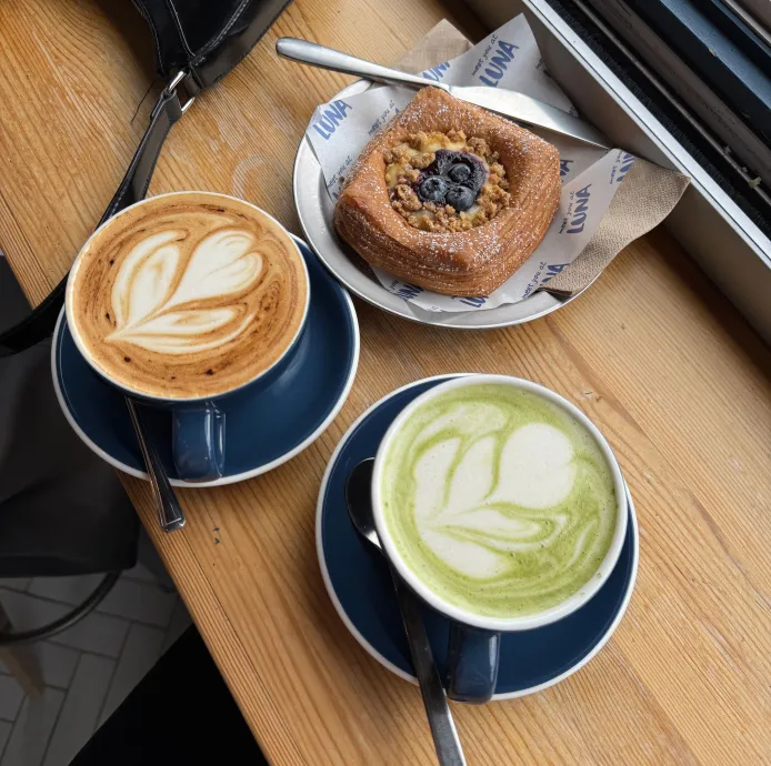 coffee and cake slice on cafe table