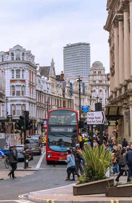 Central London street with bus and pedestrians 