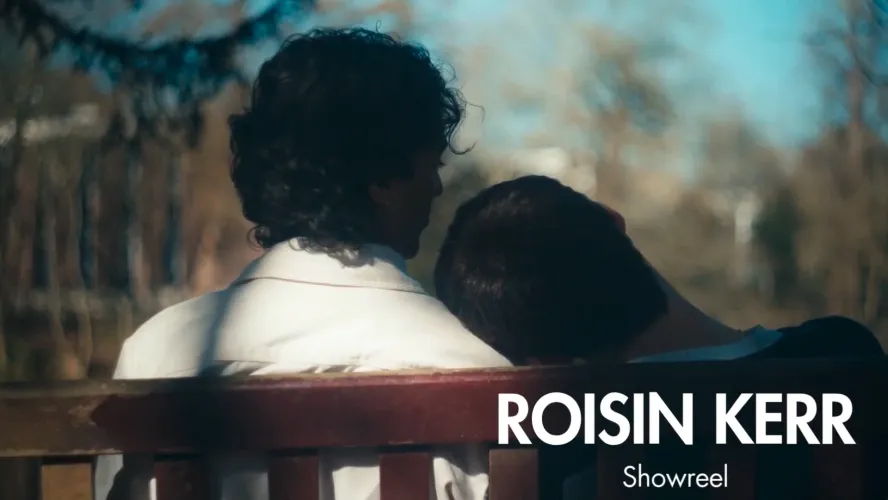 Poster for showreel for Roisin Kerr's work, with over shoulder view of man resting on another's shoulder