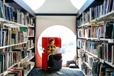 Girl sitting in library