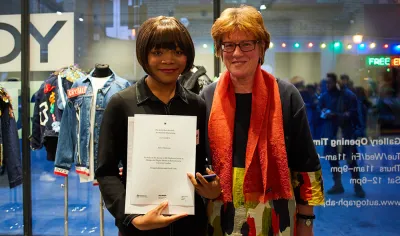 Jeancy receiving scholarship 