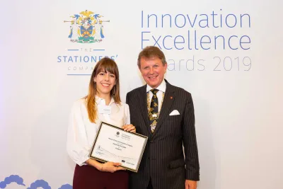 Nataly Rios accepts award 